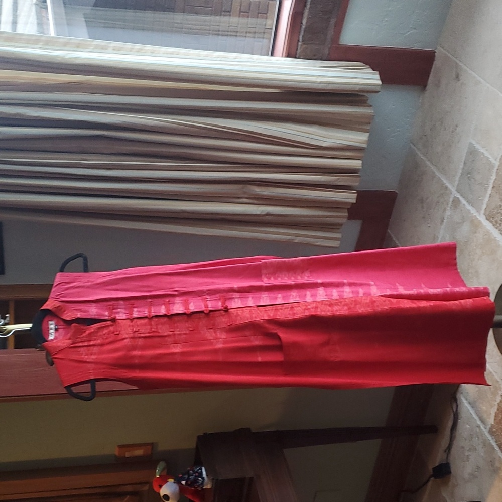 Red over tunic with toggle detailing